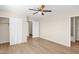 Bedroom with double doors leading to bathroom and closet at 2802 W Adams St, Phoenix, AZ 85009