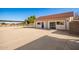 Guest house with large parking area, basketball hoop, and rural views at 7329 N 173Rd Ave, Waddell, AZ 85355