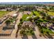 Aerial view of a large property with house, pool, and equestrian facilities at 7642 N 177Th Ave, Waddell, AZ 85355