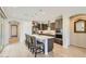 Modern kitchen with island and stainless steel appliances at 18926 N 259Th Ave, Buckeye, AZ 85396