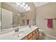 Double vanity bathroom with a shower/tub combo at 40708 N Apollo Way, Anthem, AZ 85086