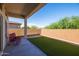 Covered patio and artificial turf backyard at 18788 E Blue Sky Dr, Rio Verde, AZ 85263