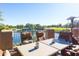 Patio overlooking a lake and golf course at 18788 E Blue Sky Dr, Rio Verde, AZ 85263