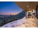 Outdoor kitchen and patio with mountain views at 8877 E Charolais Dr, Scottsdale, AZ 85262