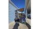 Blue golf cart with clubs and tan top at 650 N Hawes Rd # 4530, Mesa, AZ 85207