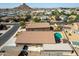 Aerial view of house with pool and detached shed in a suburban neighborhood at 786 W Jahns Dr, Casa Grande, AZ 85122