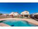 Large kidney-shaped pool, perfect for entertaining in the backyard at 7117 W Globe Ave, Phoenix, AZ 85043