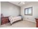 Cozy bedroom with a twin bed and window with shutters at 36382 N 35Th St, Cave Creek, AZ 85331