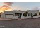 One-story home with stucco exterior, attached garage, and desert landscaping at 36382 N 35Th St, Cave Creek, AZ 85331