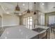 Modern kitchen with large island, stainless steel appliances and ample cabinetry at 29923 W Melvin St, Buckeye, AZ 85396