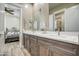 Double vanity bathroom with a view of the bedroom at 29923 W Melvin St, Buckeye, AZ 85396