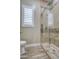 Clean bathroom with a walk-in shower and toilet at 29923 W Melvin St, Buckeye, AZ 85396