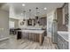 Modern kitchen with large island, stainless steel appliances, and ample cabinetry at 29923 W Melvin St, Buckeye, AZ 85396