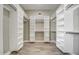 Spacious walk-in closet with ample shelving and hanging rods at 29923 W Melvin St, Buckeye, AZ 85396