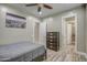 Bright bedroom with double door entry to bathroom and large closet at 29923 W Melvin St, Buckeye, AZ 85396