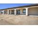 Covered patio with arched columns and access to backyard at 29923 W Melvin St, Buckeye, AZ 85396
