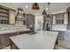 Modern kitchen with large island, stainless steel appliances, and ample cabinetry at 29923 W Melvin St, Buckeye, AZ 85396