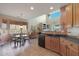 Kitchen with modern appliances and breakfast nook at 18516 W Sweet Acacia Dr, Goodyear, AZ 85338
