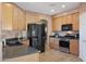 Well-equipped kitchen with ample cabinetry and counter space at 18516 W Sweet Acacia Dr, Goodyear, AZ 85338
