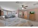Bright bedroom with sitting area and ensuite access at 18516 W Sweet Acacia Dr, Goodyear, AZ 85338
