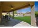 Covered patio overlooking the backyard pool at 18516 W Sweet Acacia Dr, Goodyear, AZ 85338