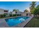Community pool and spa with building view at 3119 W Cochise Dr # 245, Phoenix, AZ 85051