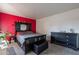 Main bedroom with a black dresser and a comfortable bed at 3119 W Cochise Dr # 245, Phoenix, AZ 85051