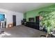 Bright living room with a home office and access to the kitchen at 3119 W Cochise Dr # 245, Phoenix, AZ 85051