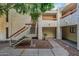 Exterior view of building with stairs and landscaping at 3119 W Cochise Dr # 245, Phoenix, AZ 85051