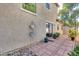 Private backyard patio with brick pavers and gravel landscaping at 3778 E Santa Fe Ln, Gilbert, AZ 85297