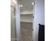 Large walk-in closet with shelving and rods at 2642 W Hidalgo Ave, Phoenix, AZ 85041