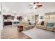 Open concept living room with kitchen views, featuring recessed lighting and tile floors at 2247 E Indian Wells Dr, Gilbert, AZ 85298