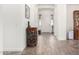 Elegant hallway with tile floors and decorative side table at 2247 E Indian Wells Dr, Gilbert, AZ 85298