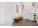 Bright and airy entryway with a bench and decorative wall hanging at 2247 E Indian Wells Dr, Gilbert, AZ 85298
