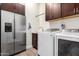 Laundry room with washer, dryer, and refrigerator at 2247 E Indian Wells Dr, Gilbert, AZ 85298