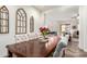 Formal dining room with a large wooden table and six chairs at 2247 E Indian Wells Dr, Gilbert, AZ 85298