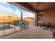 Relaxing covered patio adjacent to the pool, perfect for outdoor dining at 2247 E Indian Wells Dr, Gilbert, AZ 85298