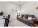 Cozy office space with a comfortable couch and workspace at 2247 E Indian Wells Dr, Gilbert, AZ 85298