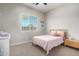 Charming bedroom with a comfortable bed and window seat at 2247 E Indian Wells Dr, Gilbert, AZ 85298