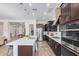Modern kitchen with stainless steel appliances, ample cabinetry, and a large island at 2247 E Indian Wells Dr, Gilbert, AZ 85298