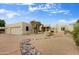 View of home's exterior, garage, and landscaping at 18830 E White Wing Dr, Rio Verde, AZ 85263