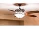 Modern ceiling fan with light kit at 23012 N Giovota Dr, Sun City West, AZ 85375