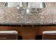 Close-up of kitchen island with granite countertop and modern sink at 23012 N Giovota Dr, Sun City West, AZ 85375