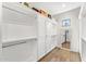 Bright walk-in closet with built-in shelving and mirror at 8742 E Villa Cassandra Dr, Scottsdale, AZ 85266