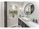 Elegant bathroom with hexagon tile, a large mirror, and a modern vanity at 8742 E Villa Cassandra Dr, Scottsdale, AZ 85266