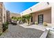 Spacious backyard with a flagstone patio and a built-in fire pit at 8742 E Villa Cassandra Dr, Scottsdale, AZ 85266