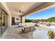 Spacious covered patio furniture and views of the pool and backyard at 8742 E Villa Cassandra Dr, Scottsdale, AZ 85266