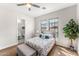 Cozy bedroom with ensuite bathroom and wood floors at 8742 E Villa Cassandra Dr, Scottsdale, AZ 85266