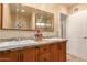 Bright bathroom with double sinks, granite countertops, and updated shower at 2705 W Summit Pl, Chandler, AZ 85224