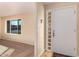 Front entry with glass block windows and neutral colored flooring at 2705 W Summit Pl, Chandler, AZ 85224